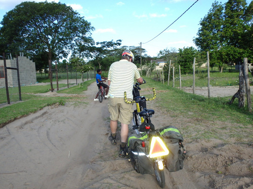 Every time we stalled our bike in the sand we would here laughter.